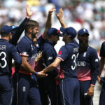 England's Mark Wood celebrates catching out Bangladesh's Imrul Kayes with team mates