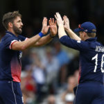 England's Liam Plunkett and Eoin Morgan celebrate taking the wicket of Bangladesh's Tamim Iqbal
