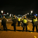 Police officers guard the approach to Southwark Bridge after an incident near London Bridge in London