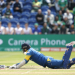 Sri Lanka's Angelo Mathews dives as Pakistan's Mohammad Hafeez unsuccessfully attempts to run him out