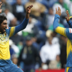 Sri Lanka's Nuwan Pradeep celebrates as Pakistan's Imad Wasim is caught by Niroshan Dickwella