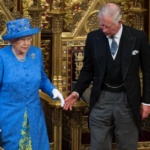 Britain's Queen Elizabeth stands with Prince Charles during the State Opening of Parliament in central London